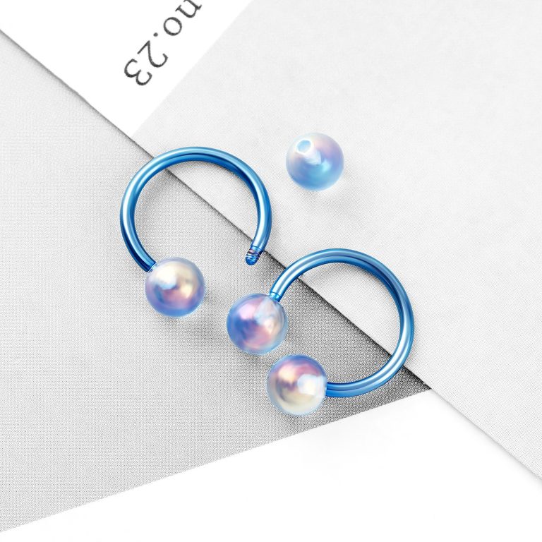 Blue colorful pierced nose studs