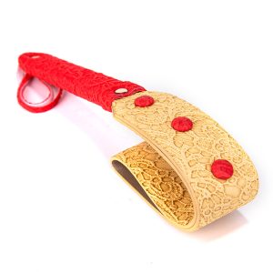 Gold rattan erotic training whip
