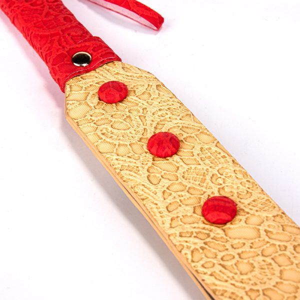 Gold rattan erotic training whip