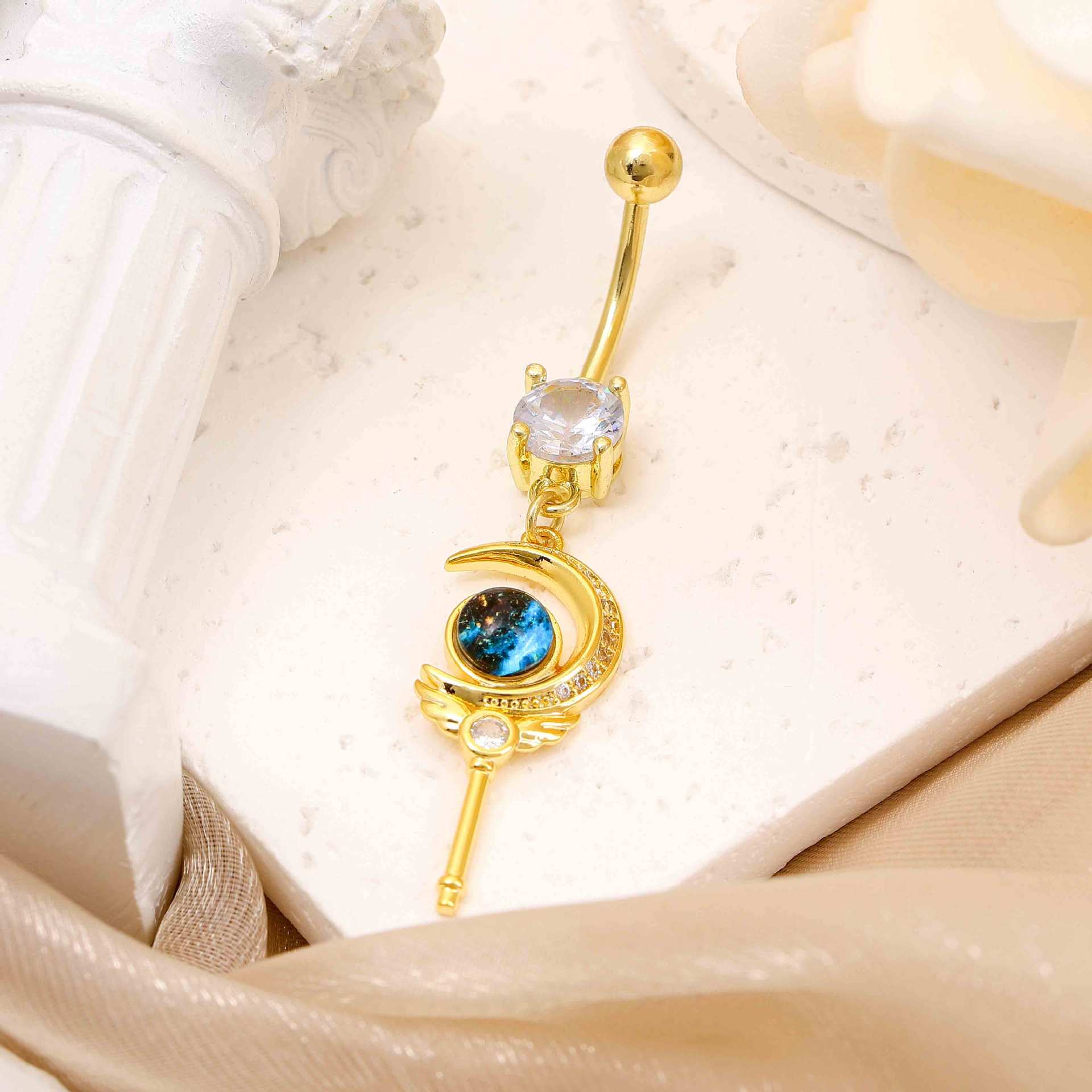Copper white stone inlaid navel buckle creative Moon star design sense navel nail niche temperament High sense navel jewelry female wholesale
