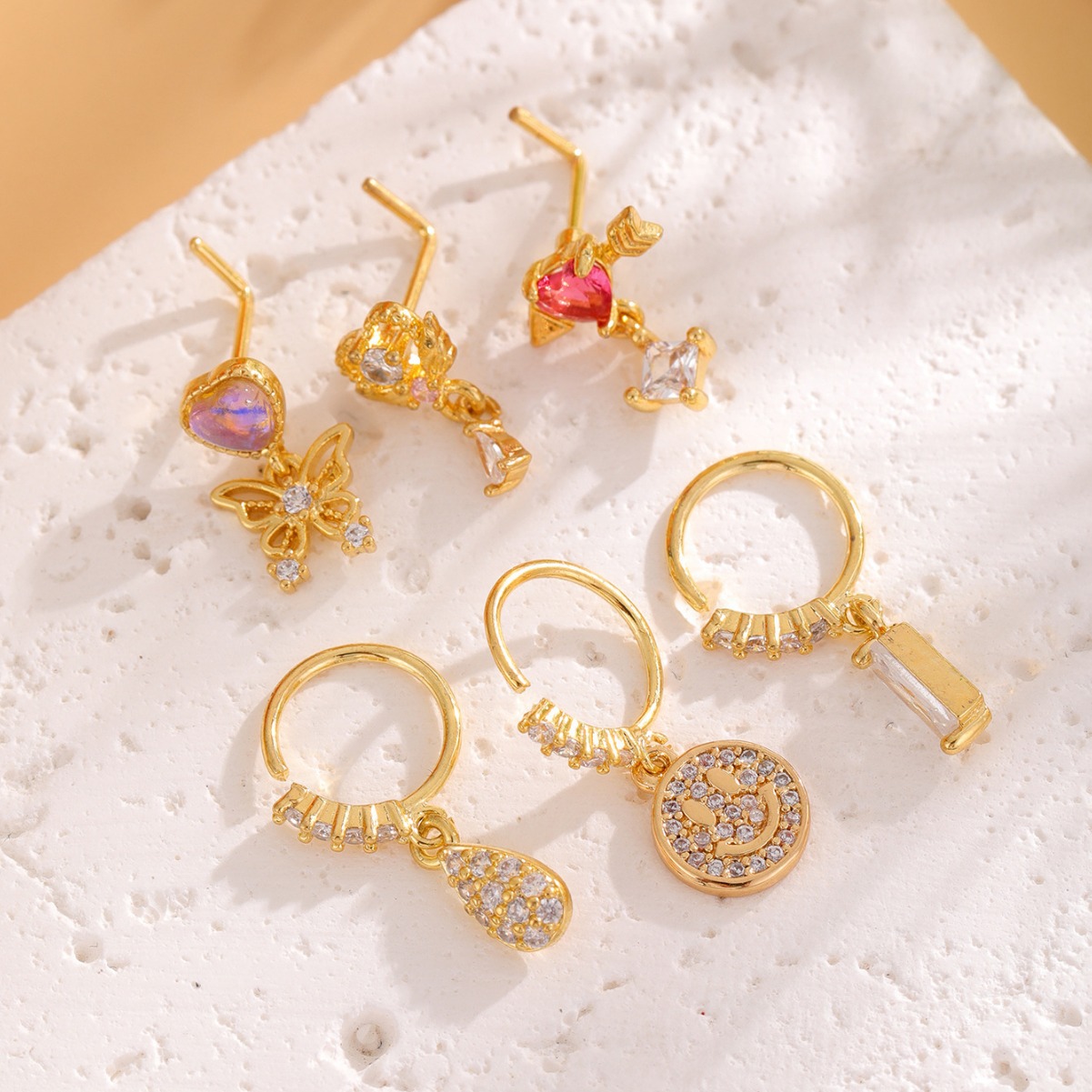 Europe and the United States cross-border copper plated real gold inlaid zircon women's nose nail nose ring jewelry manufacturers for wholesale