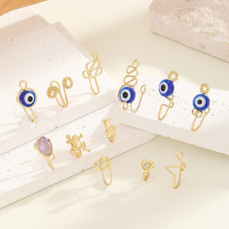 New style copper white stone inlaid exquisite variety sexy nose decoration light luxury fashion personality niche high sense nose stud wholesale