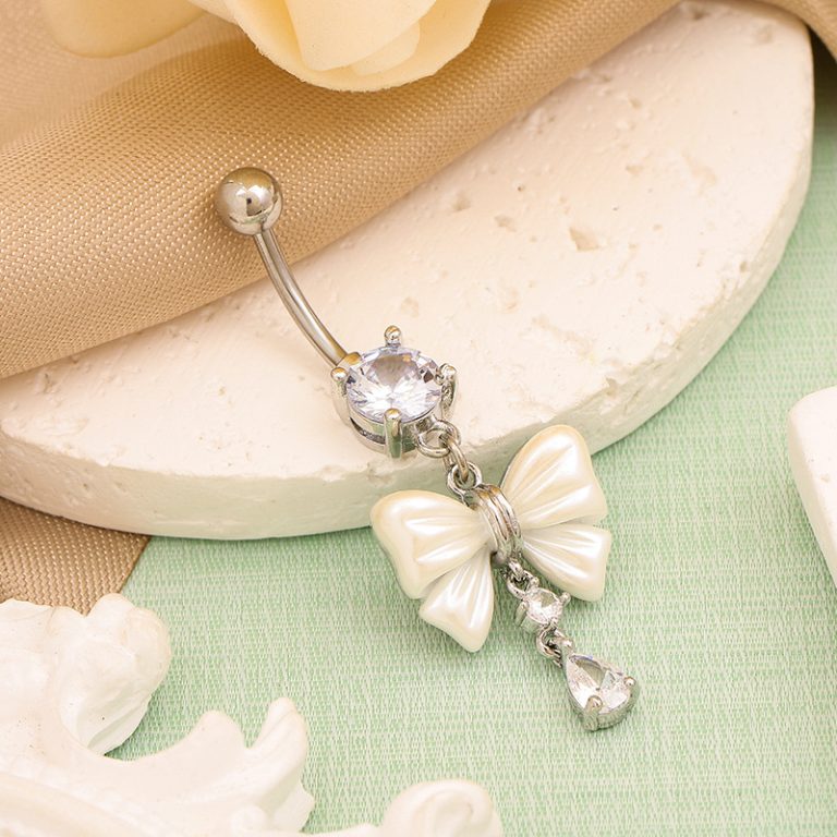New Internet celebrity bow navel jewelry trendy sweet handmade navel buckle jewelry creamy-white copper zircon navel ring wholesale